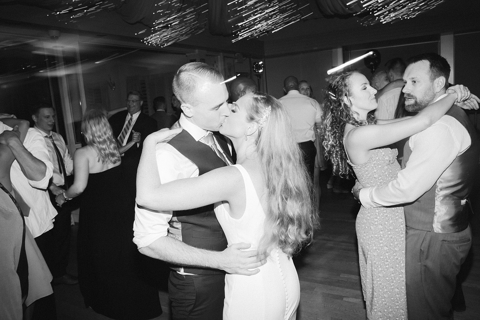 bride and groom dance together during Virginia Beach wedding reception