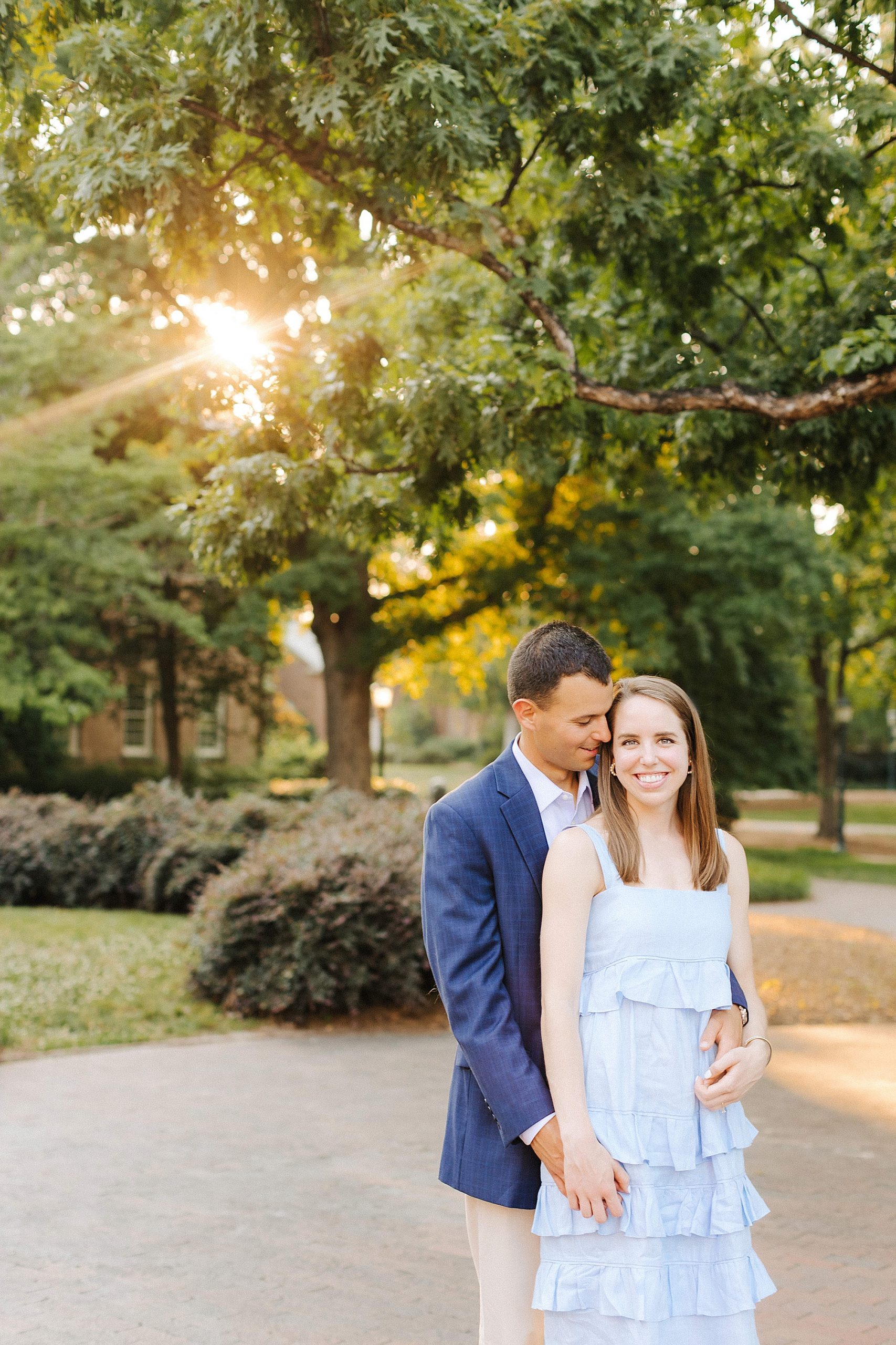 groom nuzzles bride's cheek during NC engagement portraits 