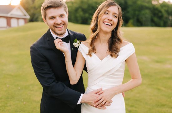 couple laughs on their wedding day at prestonwood country club in raleigh, nc