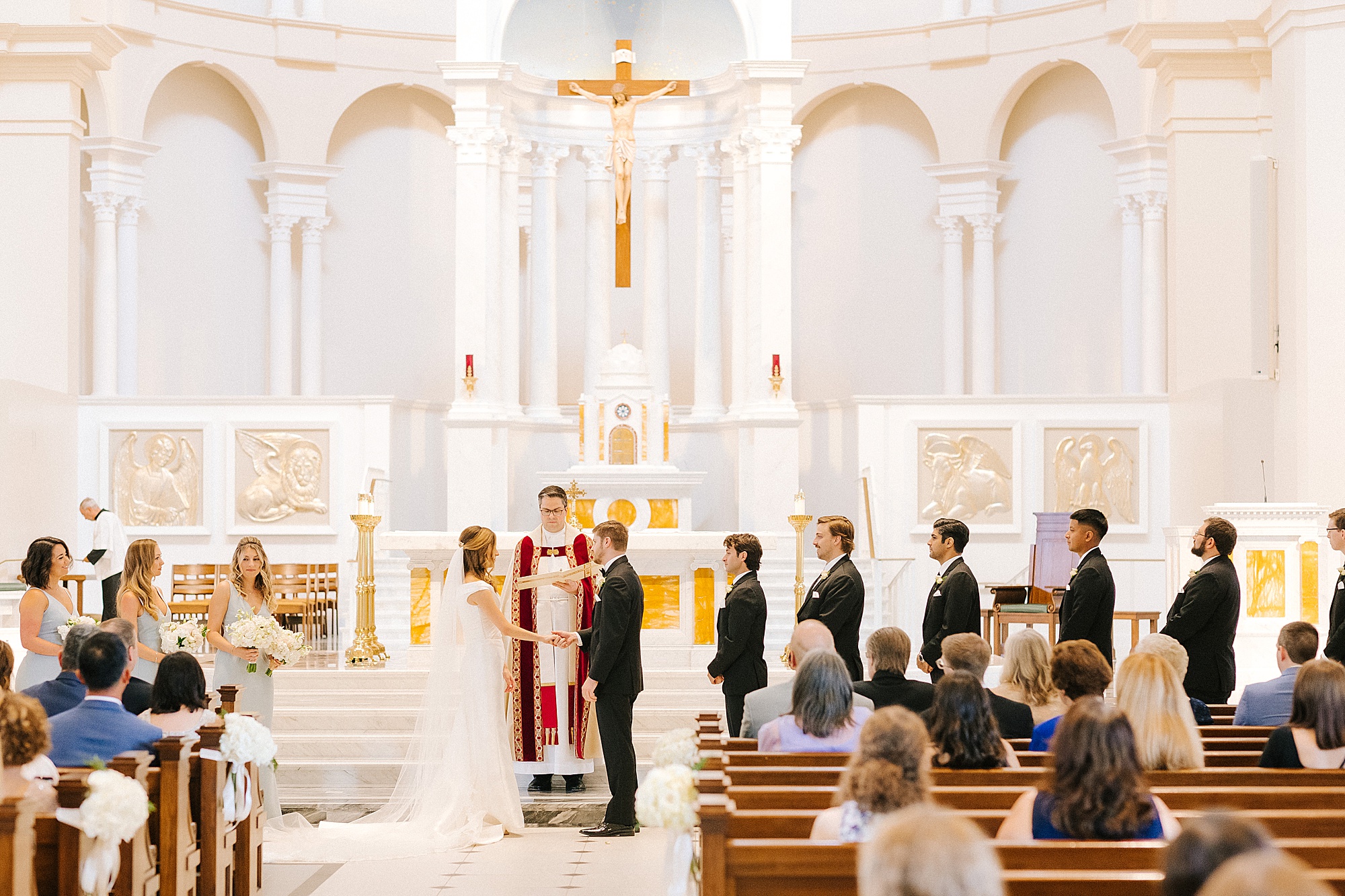 newlyweds exchange vows during traditional church wedding in Raleigh NC