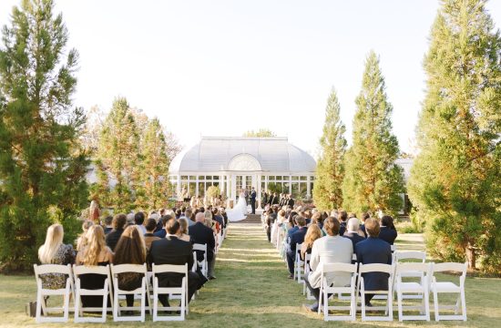 An early Fall Ceremony takes place in front of he greenhouse at Reynolda Gardens in Winston-Salem, NC
