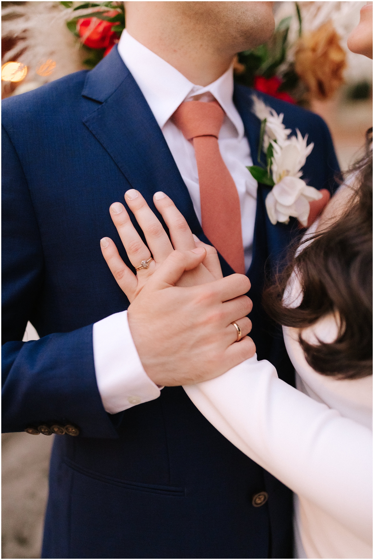 close up photo of a couple and their wedding rings in Tampa, FL
